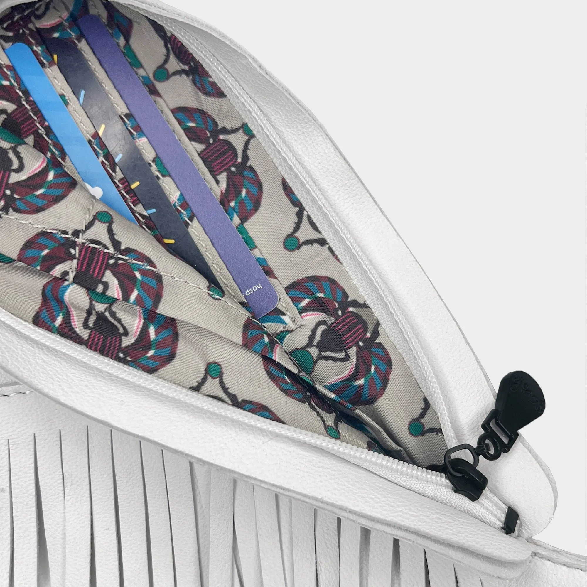 Alabaster Fringe Leather Sash Bag
